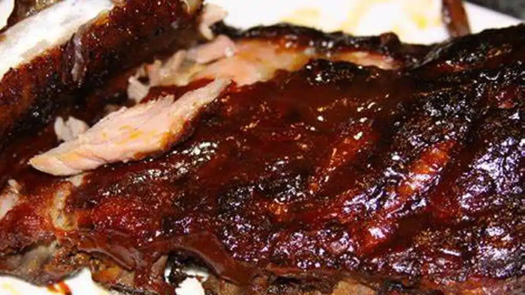 A plate of barbecue ribs, THE JUNETEENTH COMMUNITY CELEBRATION