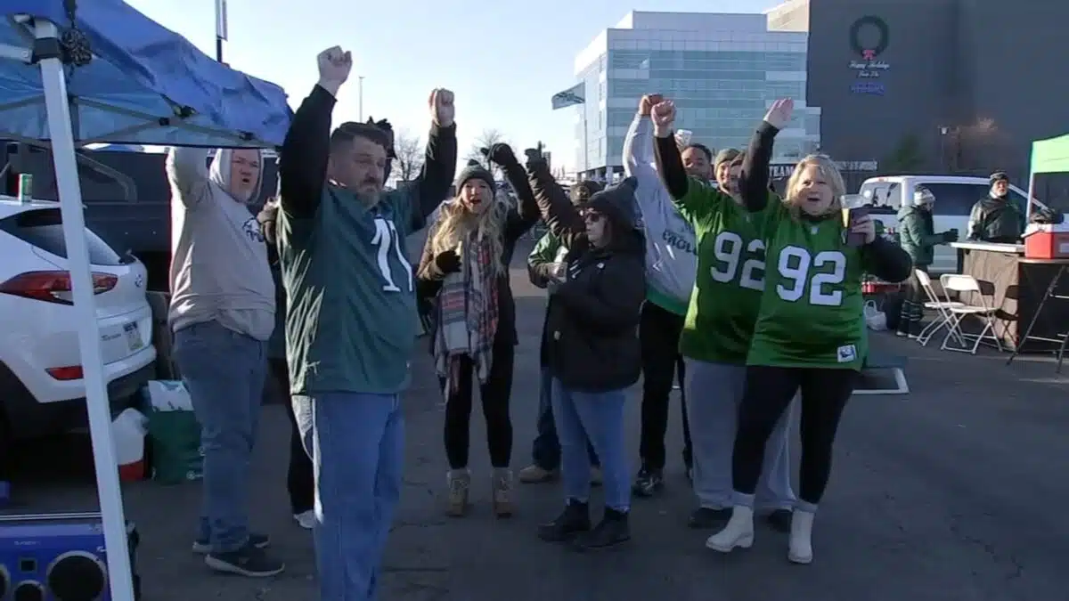 Family throws surprise birthday party at Eagles tailgate for Vietnam veteran