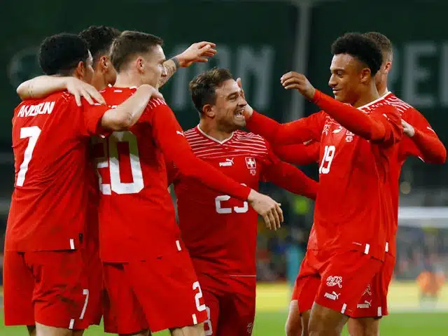 Switzerland's Xherdan Shaqiri celebrates scoring their first goal with teammates on March 26, 2024