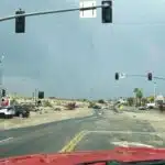 Flooding on both sides of a road.