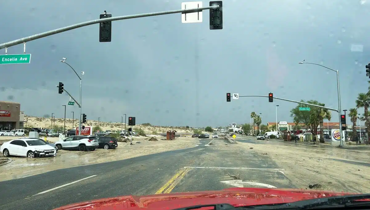 Flooding on both sides of a road.